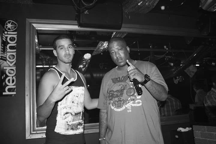 Jordan Oliver with The Outlawz member E.D.I. Mean.