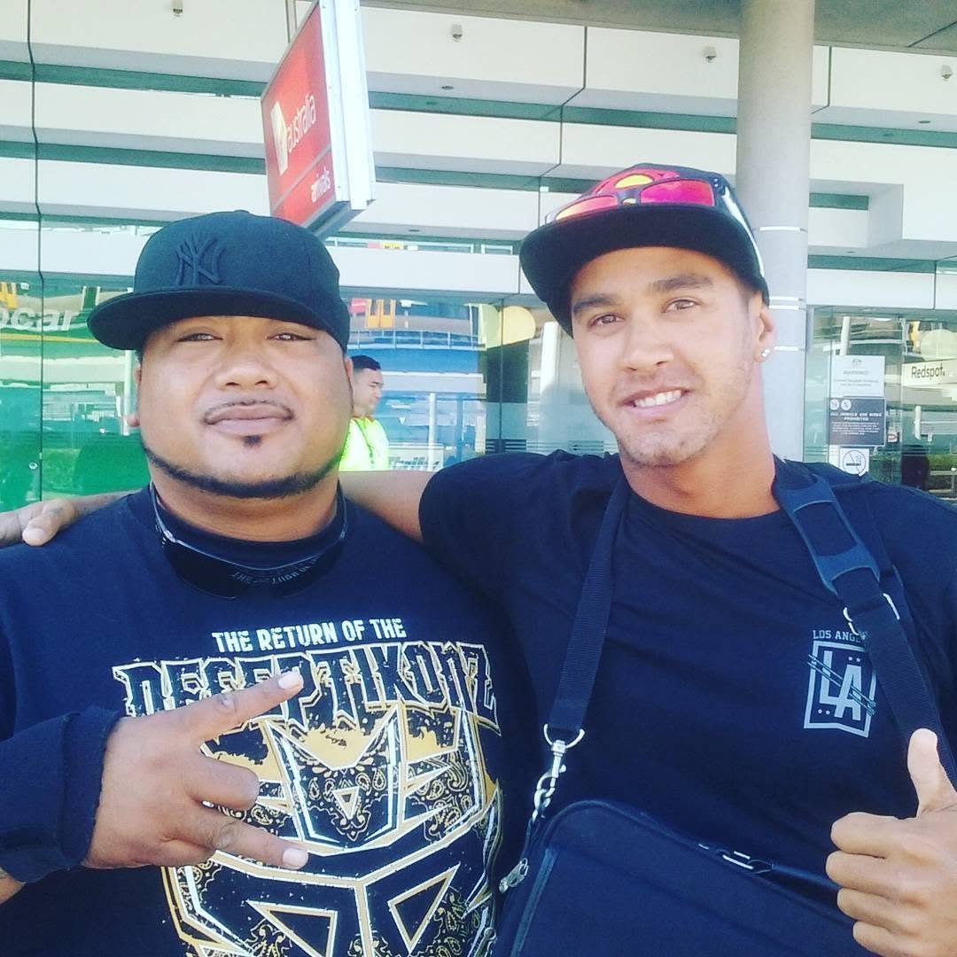 Jordan Oliver with New Zealand rapper Savage.
